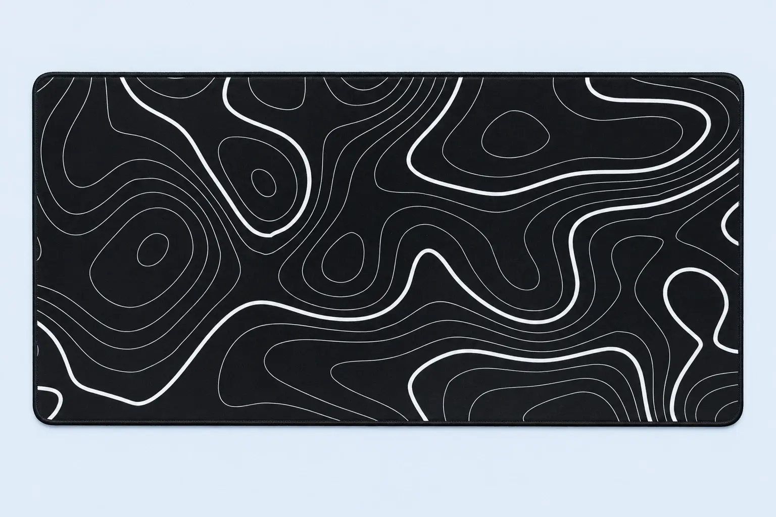Cloud Blue studio presentation of Black Topographic Deskmat.